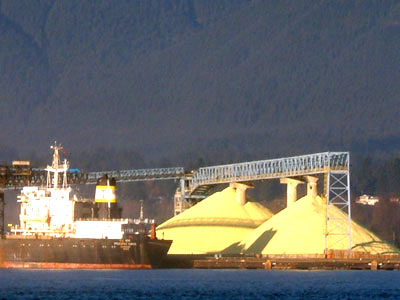 This is a picture of the sulphur pile that sits along North Vancouver's shore line.